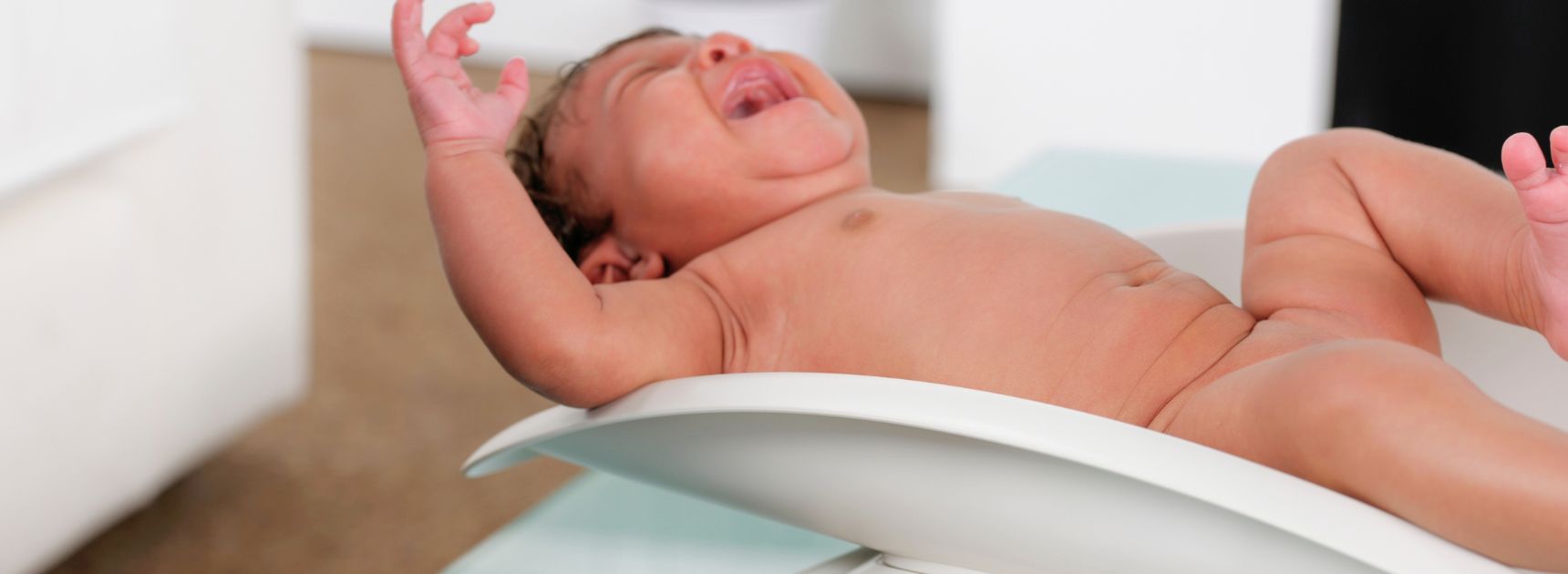 Baby wird gewogen